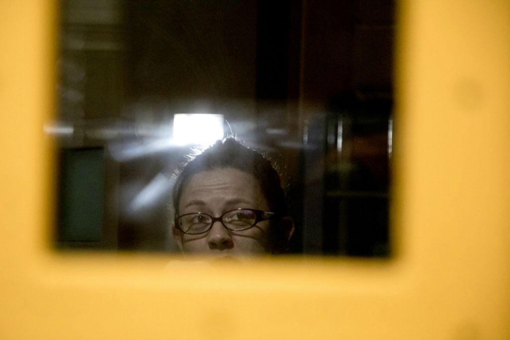 Best of Show - Jessica Phelps / Newark Advocate, “Life Locked Up in the County Jail”A female inmate looks out from her cell block while brushing her teeth on the morning of May 29, 2020. 